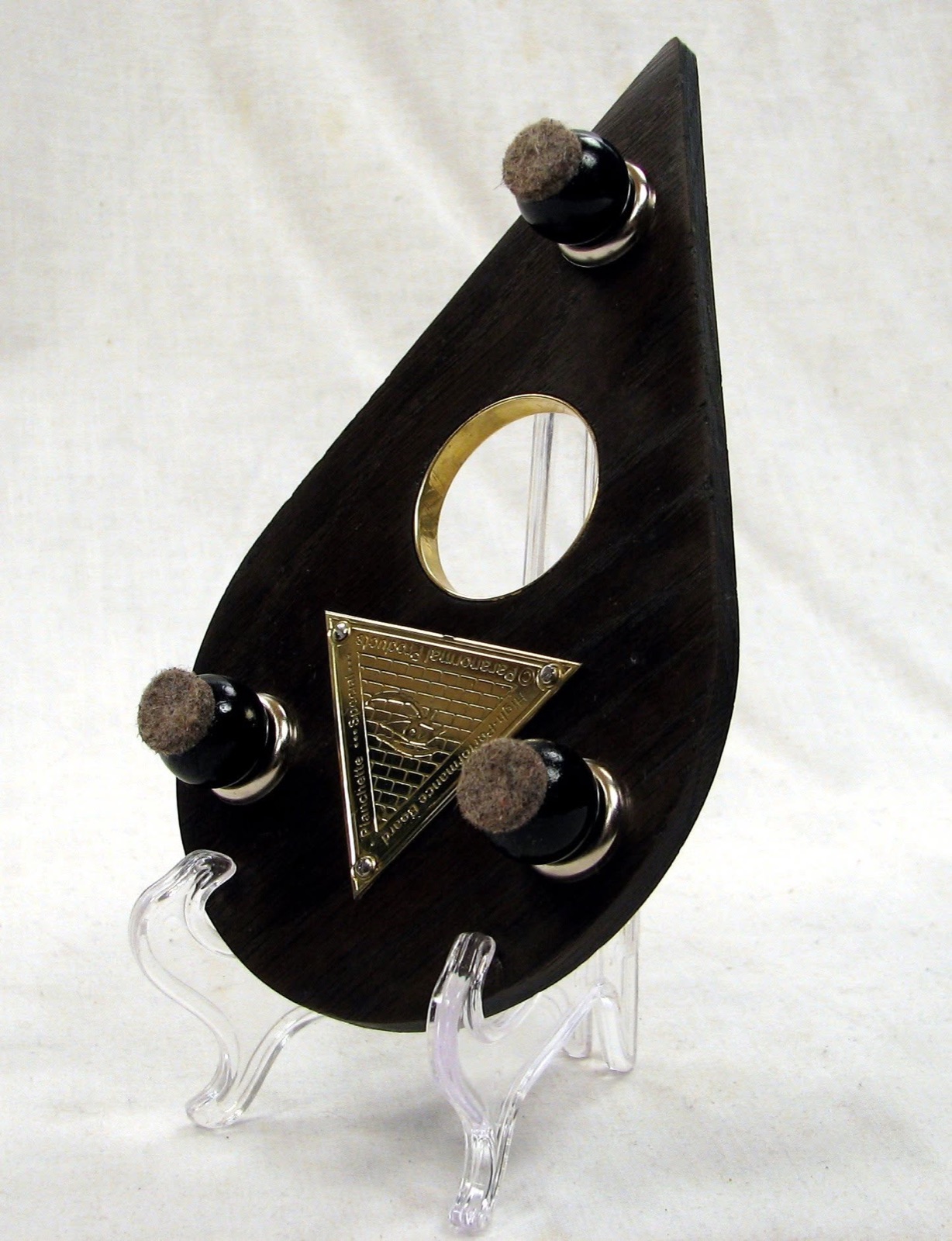 The underside of a pointer planchette